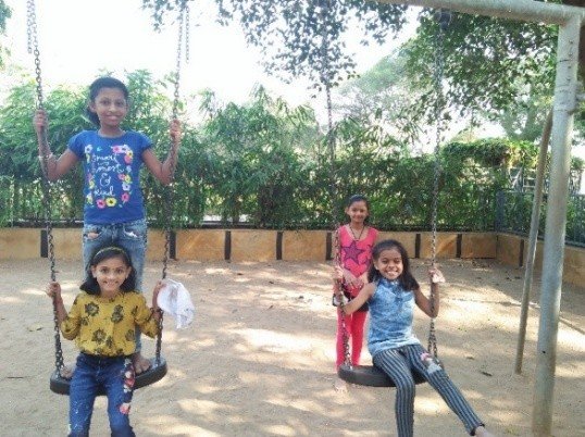 Children Having a Swingin Good Time